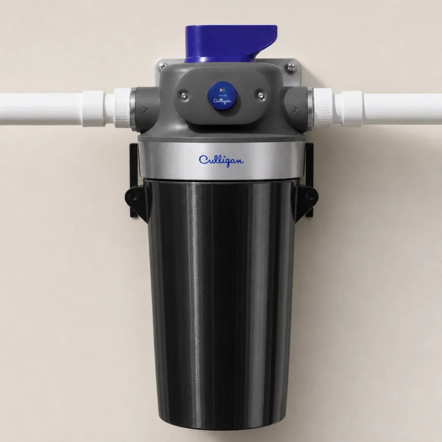 Fitted black cover on a Culligan WH-HD200-C water filter housing