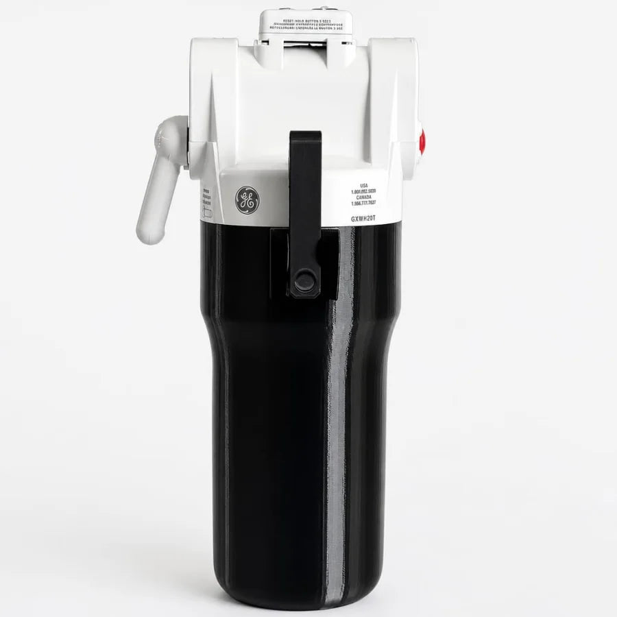 Black model-specific cover installed on a GE GXWH20T filter housing